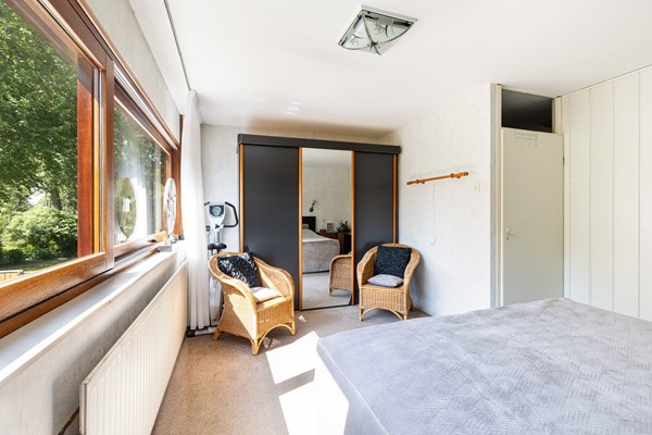 Foto - Te koop: Goed onderhouden tussenwoning in rustige woonwijk!